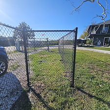 Black-Vinyl-Chain-Link-Fence-Installation-by-WhatAFence-The-Perfect-Blend-of-Style-and-Functionality 1