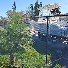 Black-Vinyl-Chain-Link-Fence-Installation-by-WhatAFence-The-Perfect-Blend-of-Style-and-Functionality 0