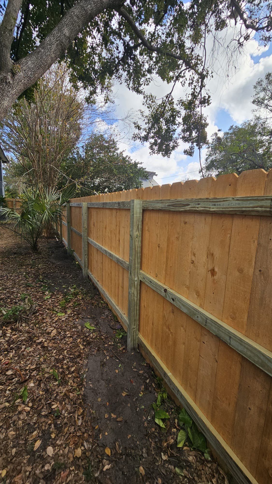 Custom Wooden Fence Installation by WhatAFence